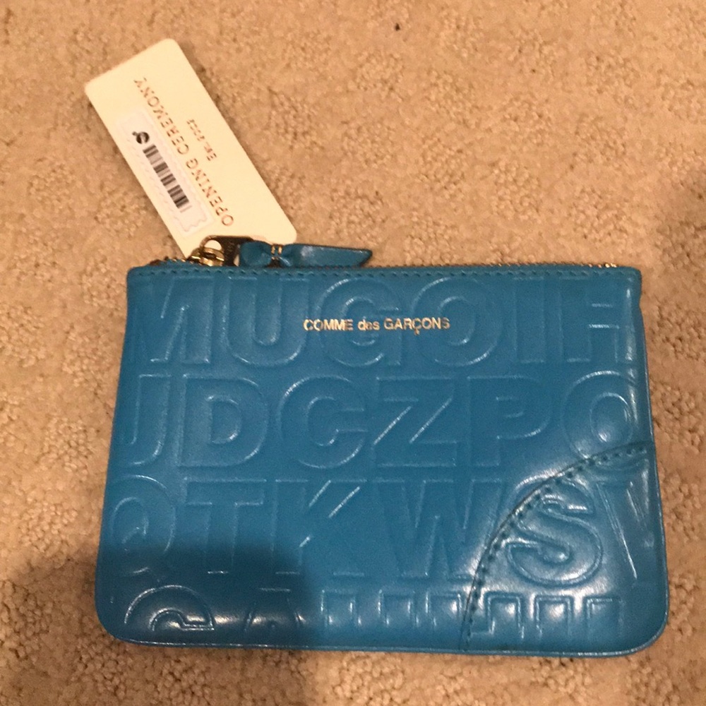 COMME DES GARÇON blue embossed zip top pouch NWT
